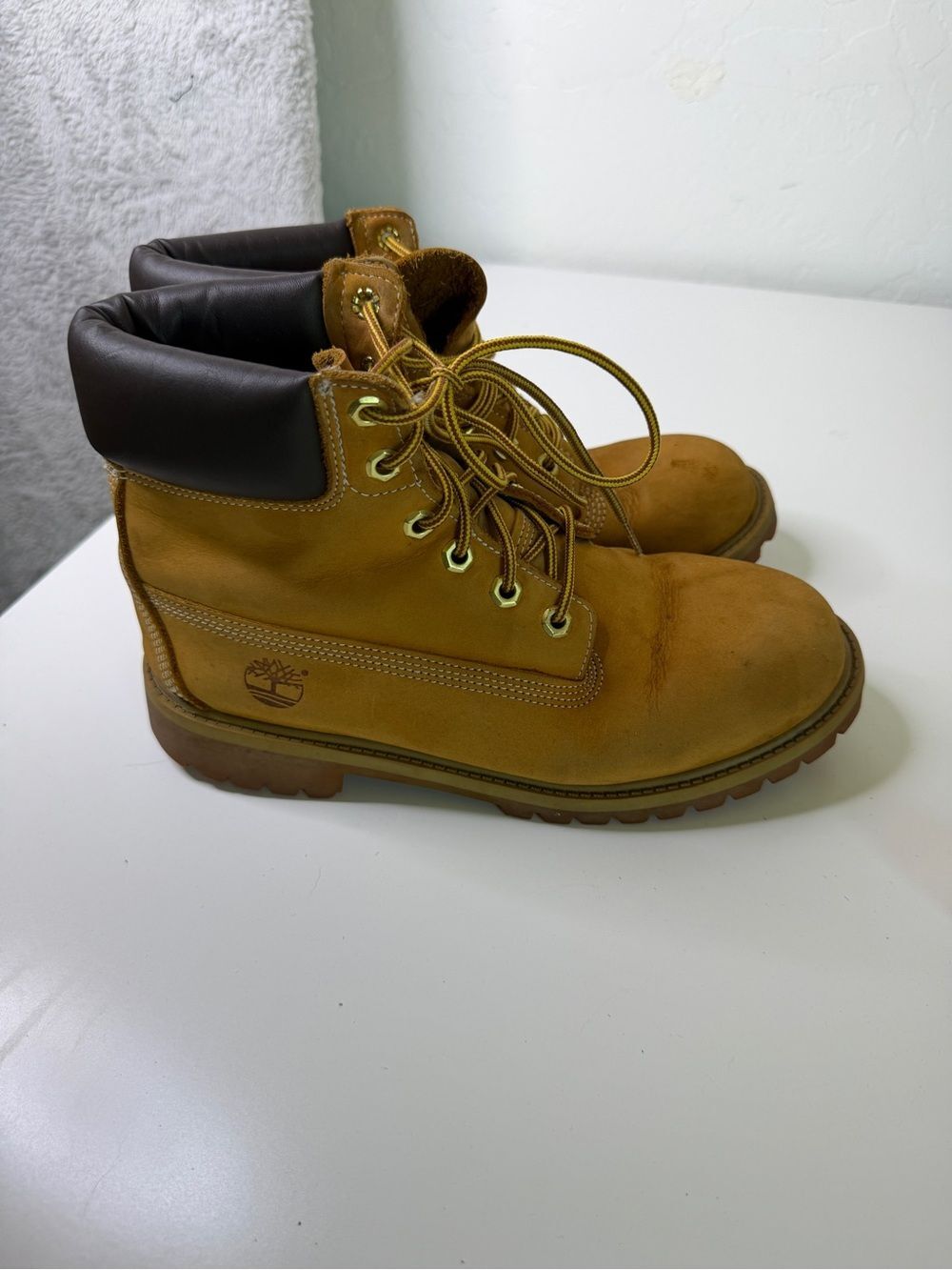 Timberland Premium 6-Inch Waterproof Boots in the classic wheat nubuck color
